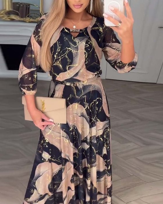 Elegancka szyfonowa sukienka z nadrukiem na trzy czwarte rękawa