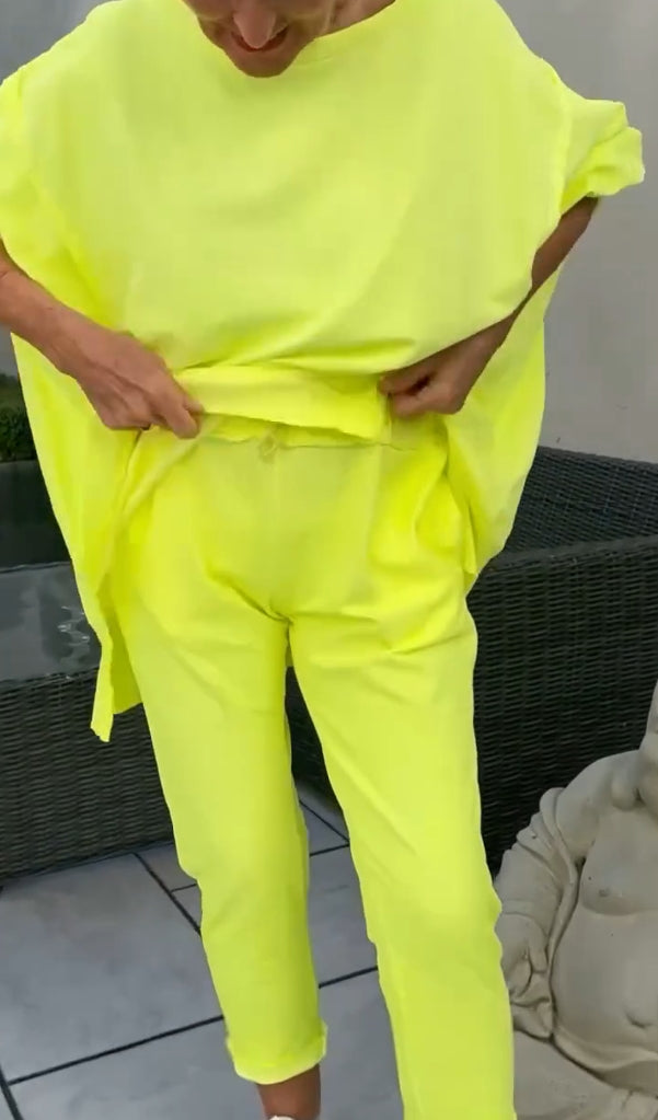 Letni damski okrągły dekolt rozcięcie jasny kolor casualowy garnitur