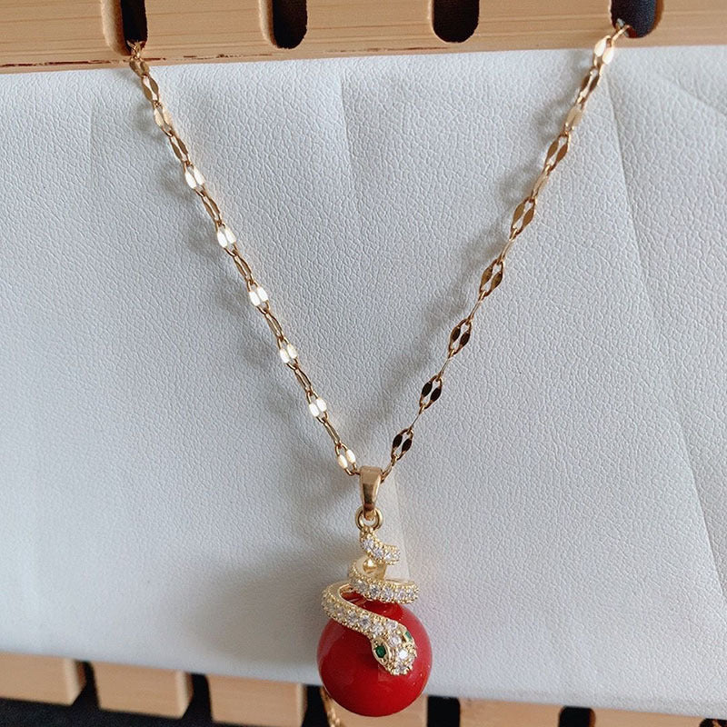 🐍Specjalna oferta noworoczna🎀 Kolczyki z pozłacanej perły w kształcie węża