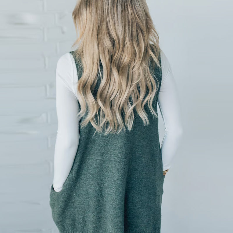 Damska luźna kamizelka sweterkowa z golfem i kieszeniami