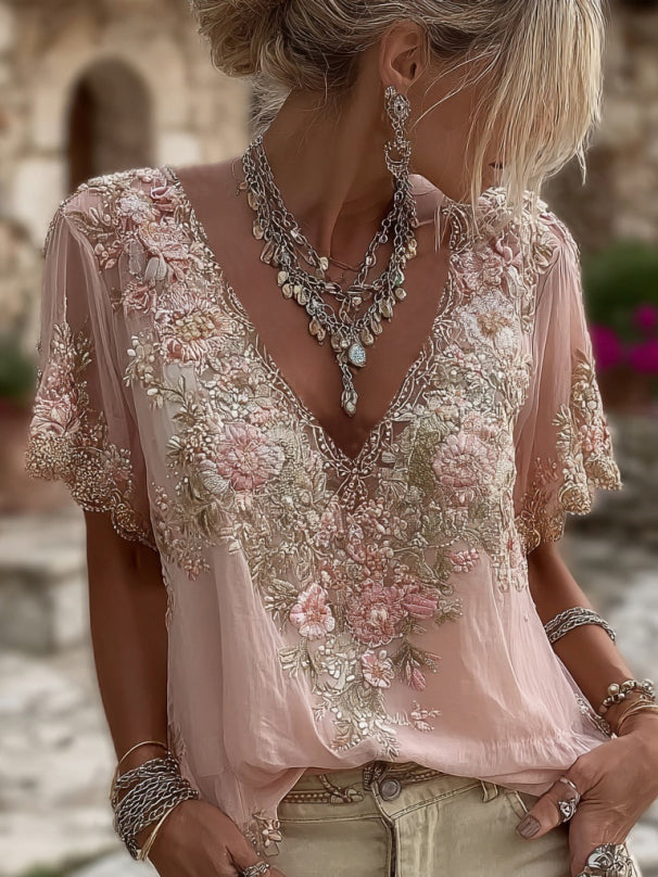 Damska koszulka z krótkim rękawem i dekoltem w serek z haftem kwiatowym, wykonana z mieszanki lnu