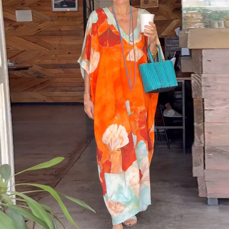 Sukienka z długim, luźnym rękawem i nadrukiem kwiatowym