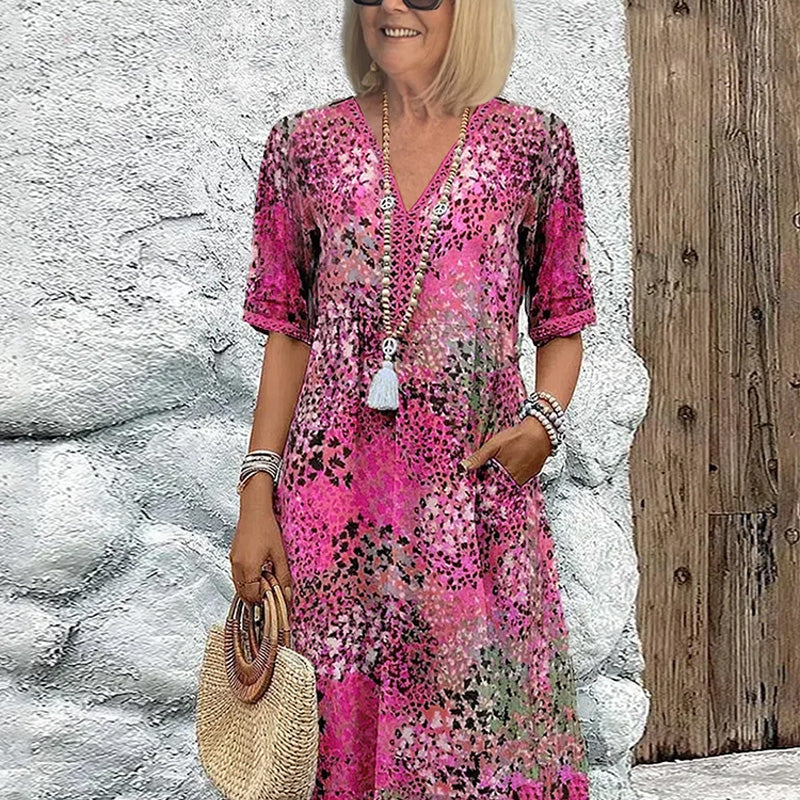 💥Damska sukienka midi z dekoltem w serek i nadrukiem