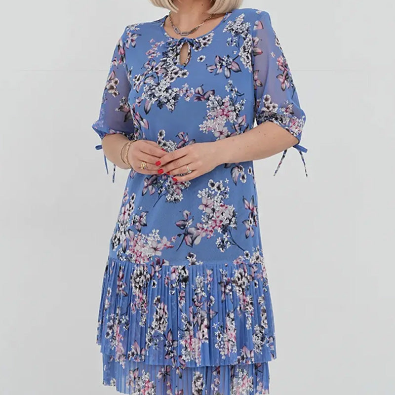 Elegancka damska sukienka plisowana z krótkim rękawem i długą spódnicą