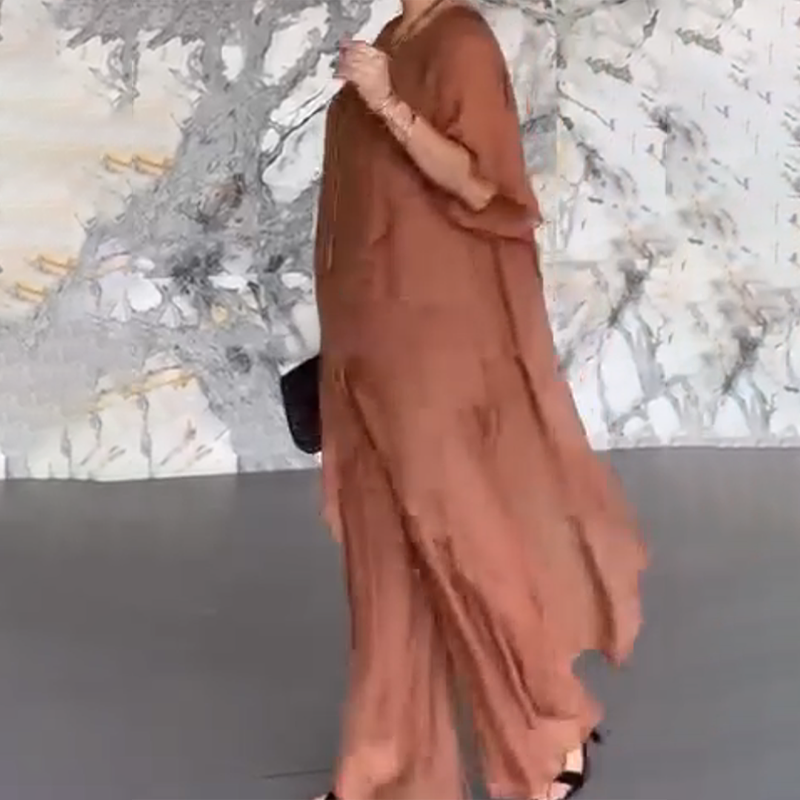 🛍️✨ Damski komplet składający się z nieregularnej bluzki i lekkich spodni